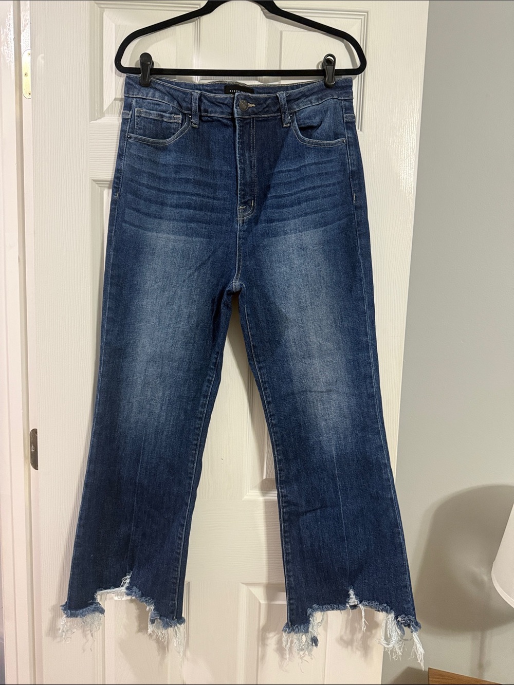 High-Rise Dark Blue Flare Jeans with Frayed Hem - excellent stretch